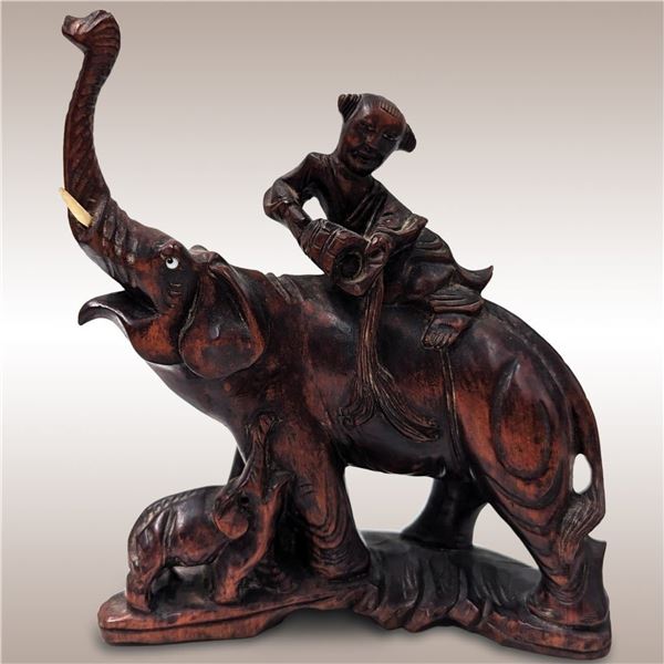 Finely Carved Chinese Hardwood Sculpture Of A Man Riding An Elephant