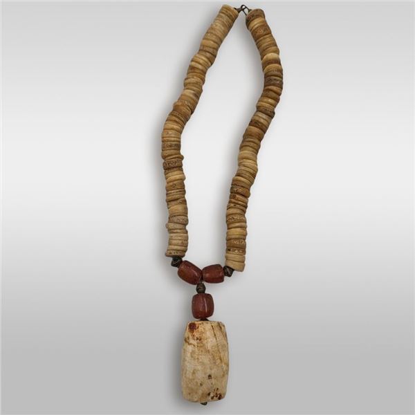 An Antique Carved Bone, Amber, And Brass Necklace, Likely Of African Origin