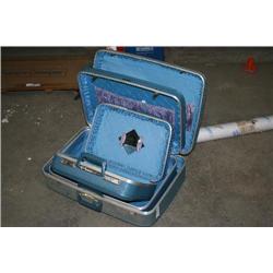 3 BLUE SUIT CASES