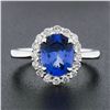 Image 2 : 14k White Gold 2.60 ctw Violet Blue Oval Tanzanite w/ Round Diamond Halo Ring