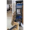 Image 1 : Black Plastic 4-Tier Shelf & Contents: Angle Iron, Tarps, Supplies, etc