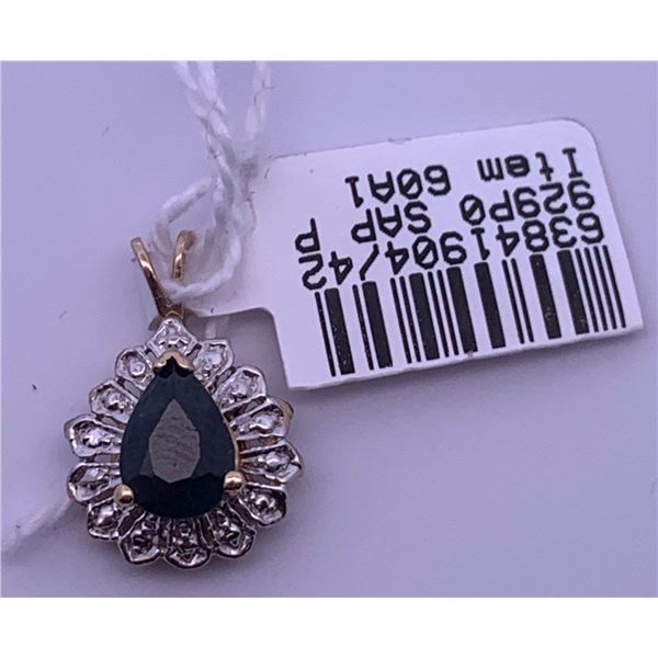 10k yellow gold pendant with a blue centre stone; weighs 1.35 grams.