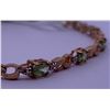 Image 1 : 10k yellow gold bracelet with peridot accented by melee diamonds; weighs 3.97 grams.