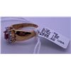 Image 2 : 10k yellow gold ring with a centre ruby; weighs 2.56 grams.
