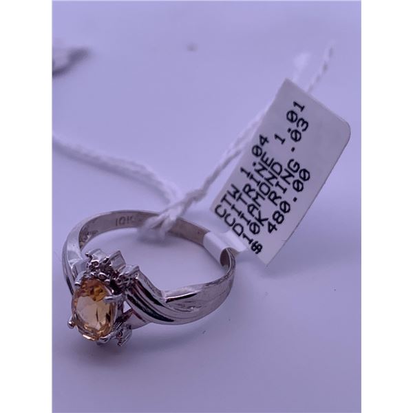 10k white gold ring with citrine, and melee diamonds; weighs 2.17 grams.