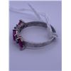 Image 1 : 10k white gold ring with 4 pink stones, and 6 small clear stones accenting; weighs 2.06 grams.