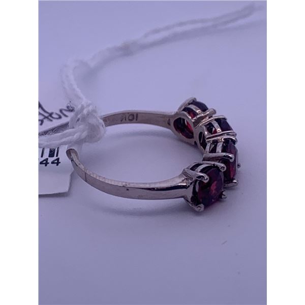 10k white gold ring with 4 garnets; weighs 2.37 grams.