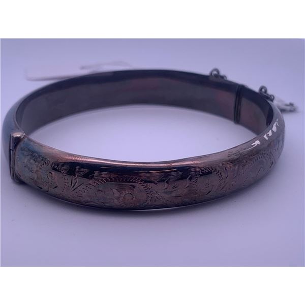 Silver bangle; weighs 14.85 grams