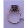 Image 1 : 10k yellow gold ring with large blue centre stone; weighs 2.80 grams