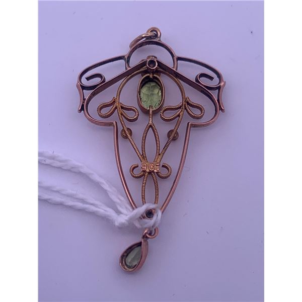 10k rose gold pendant with 2 peridots; weighs 2.25 grams.