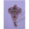 Image 2 : 10k rose gold pendant with 2 peridots; weighs 2.25 grams.