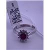 Image 3 : 10k white gold ring with a large centre ruby, and melee diamonds surrounding; weighs 2.57 grams