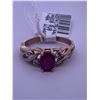 Image 1 : 10K yellow gold ring with a ruby centre stone, with melee diamonds; weighs 2.47 grams