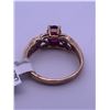 Image 4 : 10K yellow gold ring with a ruby centre stone, with melee diamonds; weighs 2.47 grams