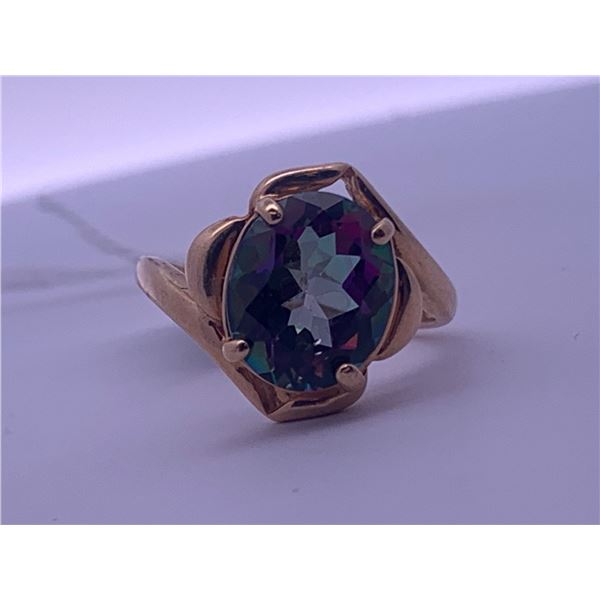 14k yellow gold ring with a large mystic topaz centre stone; weighs 3.84 grams