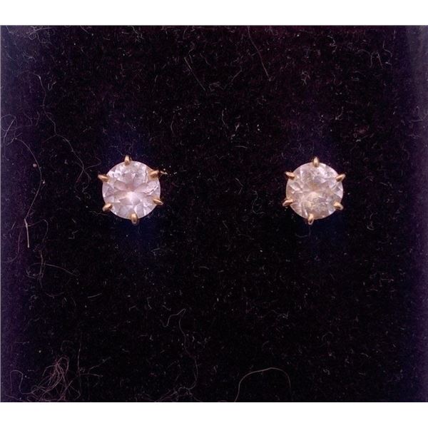 14k yellow gold studs with colorless stone; weighs 1.35 gram total