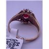 Image 4 : 10k yellow gold ring with garnet centre stone, and 6 melee diamonds; weighs 2.17 grams