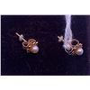 Image 1 : 14k yellow gold studs with white pearls; total weight is 0.56 grams