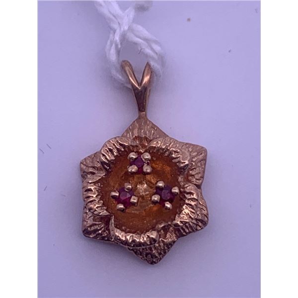 14k yellow gold pendant with 3 small rubies(?); weighs 2.39 grams