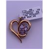 Image 1 : 10k yellow gold heart pendant with 3 tanzanite stones, and 1 melee diamond; weighs 3.29 grams