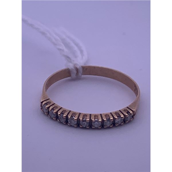 18k yellow gold ring with melee diamonds; weighs 1.25 grams