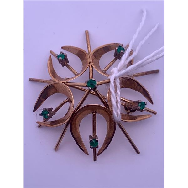 18k yellow gold brooch with 6 small emeralds(?); weighs 7.23 grams