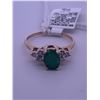 Image 1 : 14k yellow gold ring with an emerald centre stone, and 6 melee diamonds; weighs 2.11 grams