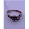 Image 1 : 10k yellow gold ring with a blue centre stone, and colourless melee stones; weighs 1.67 grams
