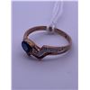 Image 2 : 10k yellow gold ring with a blue centre stone, and colourless melee stones; weighs 1.67 grams