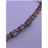 Image 1 : 10k yellow gold bracelet with blue topaz; weight is 3.69 grams