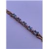 Image 4 : 10k yellow gold bracelet with blue topaz; weight is 3.69 grams