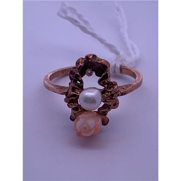 10k gold ring with white pearl and rose shaped stone; weighs 2.70 grams