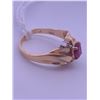 Image 2 : 10k gold ring with a ruby(?) centre stone and 2 melee diamonds; weighs 3.24 grams