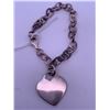Image 2 : Silver bracelet with plain heart charm; weighs 18.03 grams