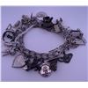Image 1 : Sterling silver (925) bracelet with many different charms; total weight is 69.57 grams