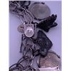 Image 2 : Sterling silver (925) bracelet with many different charms; total weight is 69.57 grams