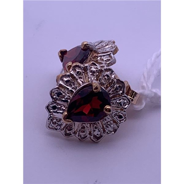 10k yellow gold earrings with large garnets; weighs 2.10 grams