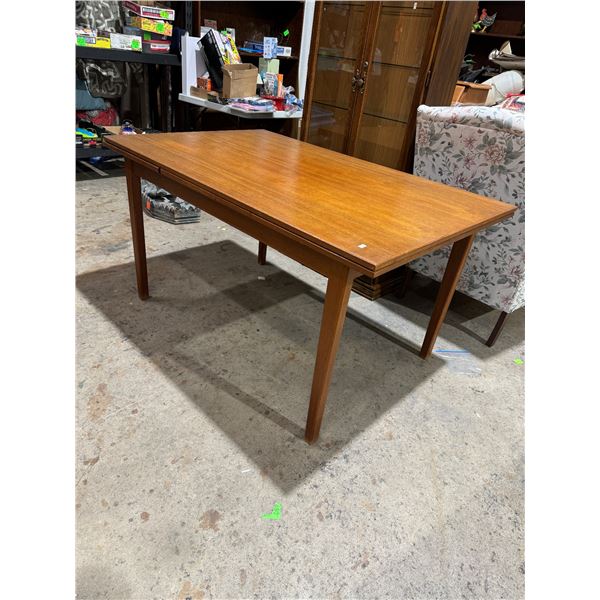 Teak table withdraw leafs