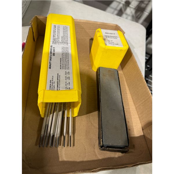 knife, sharpening stone and welding rods