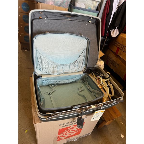 Vintage suitcases and hangers