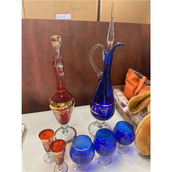 Decanters and glasses red decanter has been repaired