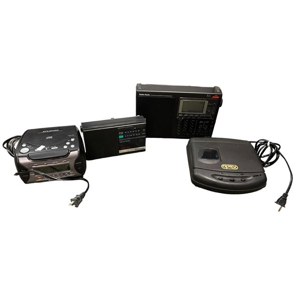 3 Vintage Radios And Type Rewinder, Panasonic, Radio Shack, Sylvania, And Optex