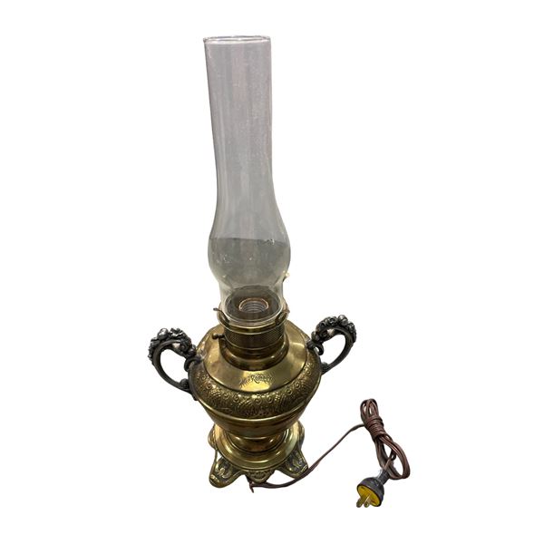 The Rodheste Brass Embossed Handled Oil Lamp