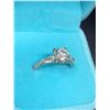 Image 2 : 925 Ring With Round Cut Moissanite, 2 Baguette Cubic Zirconium, And 12 Round Cut Cubic Zirconium