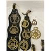 Image 2 : Assortment Of Brass Horse Medallions On Leather