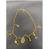 Image 1 : Charm Bracelet With Assorted Charms, Some Are Sterling