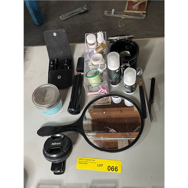 Group of Beauty Products Including - Mirror, Pluckers, Nail Polish Shaker, Nikon Lens, Brow Fixing,