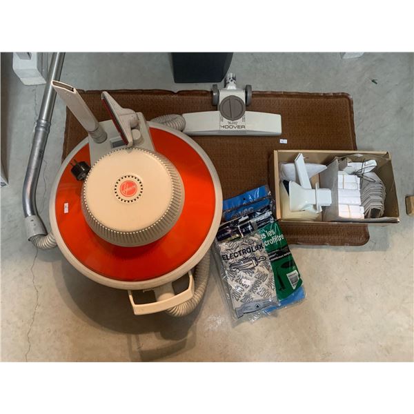 Vintage Hoover circular vacuum with accessories; Model S3065