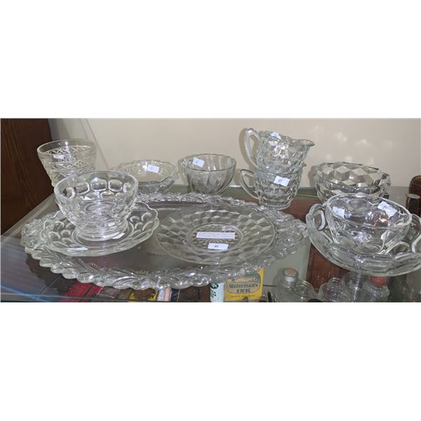 Set of various clear glasses; some with matching plates