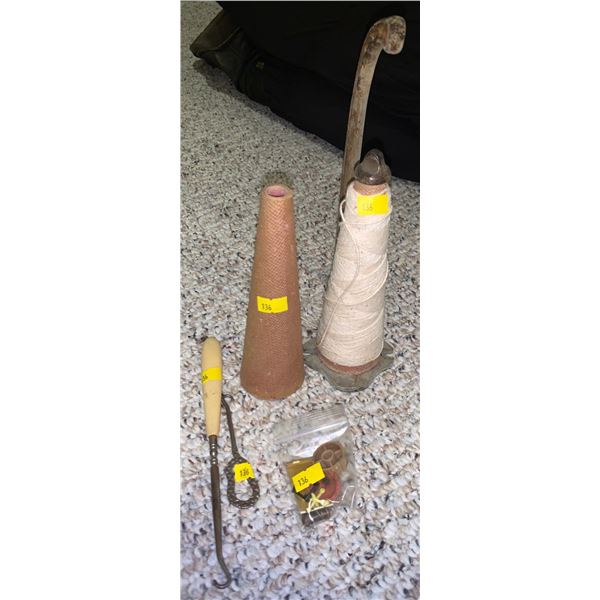 Set of antique button hooks and thread with holder